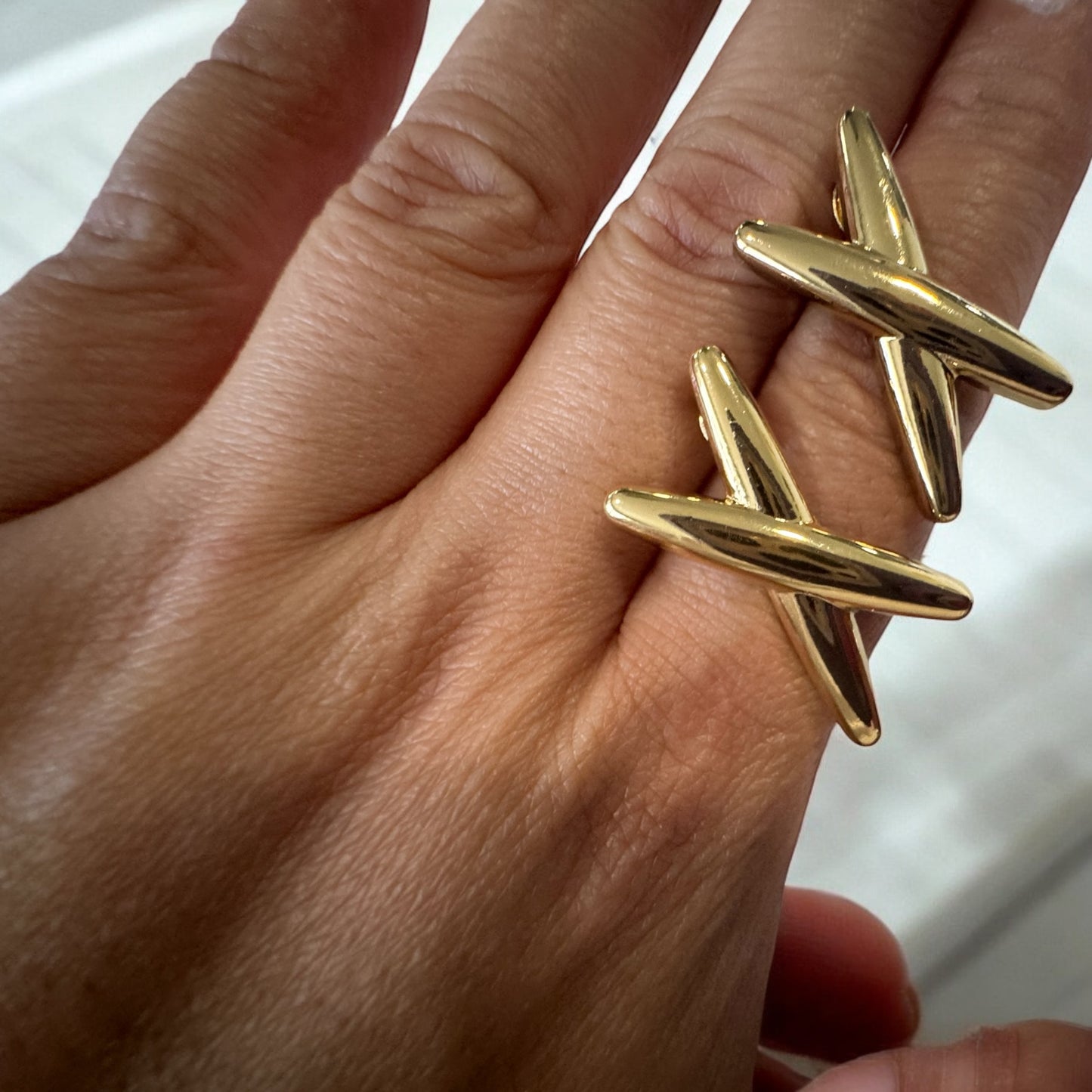 X with Gold Earrings